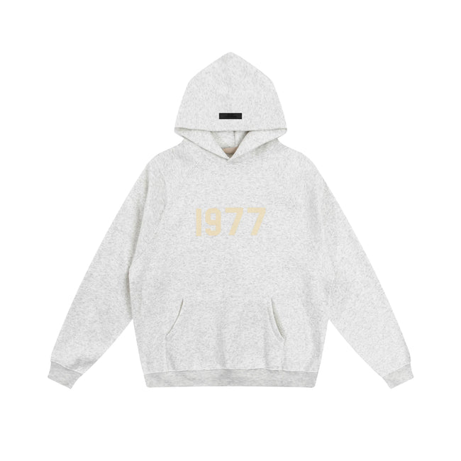 Fear of God Essentials 1977 Hoodie & Sweatpants Set Light Oat Heather Hover Image